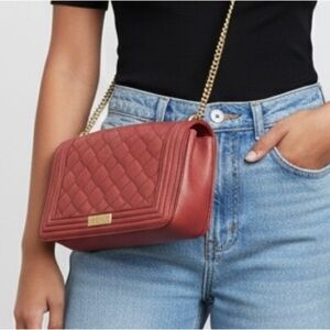 Bebe Quilted Crossbody with Gold Chain. Chic, Retro, with the classic Bebe feel